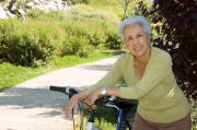 Older adult rding bicycle