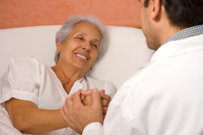 Woman being comforted in bed